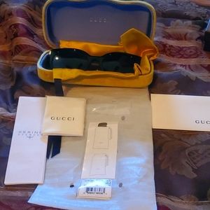 Gucci sunglasses  Hp new bagged tagged warranty includes all case gorgeous suede